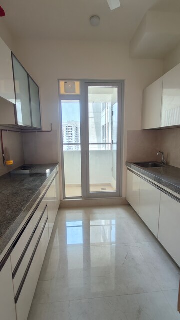 Kitchen in 2 BHK Apartment at Piramal Vaikunth, Balkum Pada – for Rent