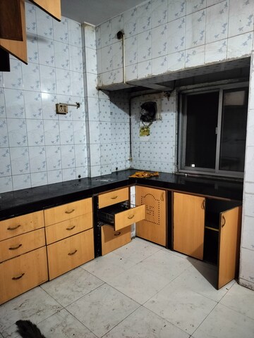 Kitchen in 1.5 BHK Apartment at Ambika CHS Nerul, Nerul Sector 19 – for Rent