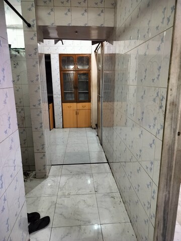 Building Lobby in 1.5 BHK Apartment at Ambika CHS Nerul, Nerul Sector 19 – for Rent