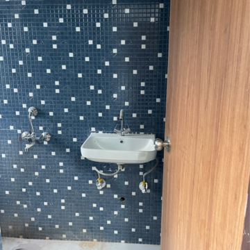 Bathroom in 1 RK Apartment at Emaar Emerald Floors Premier, Sector 65 – for Rent