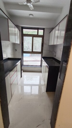Kitchen in 2 BHK Apartment at Neminath Nemi Bhavan, Goregaon West – for Sale
