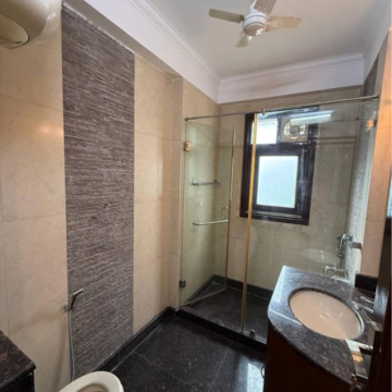 Bathroom in 3 BHK Builder Floor at Pamposh Enclave – for Rent