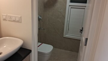 Bathroom in 1 BHK Apartment at Sowparnika Rhythm Of Rain, Whitefield – for Sale
