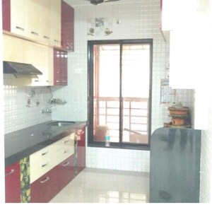 Kitchen in 2 BHK Apartment at Mahavir Kalpavruksha, Ghodbunder Road – for Sale