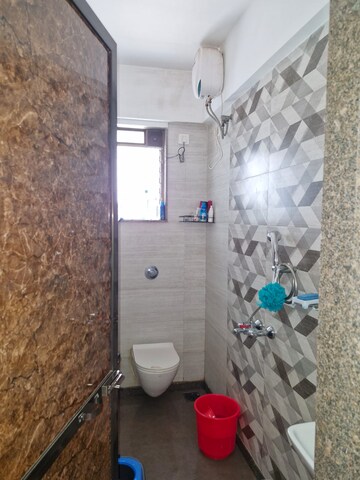 Bathroom in 1.5 BHK Apartment at Roha Satsang Bharti, Malad East – for Rent