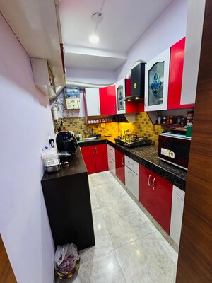 Kitchen in 2 BHK Apartment at Orris Carnation Residency, Sector 85 – for Sale