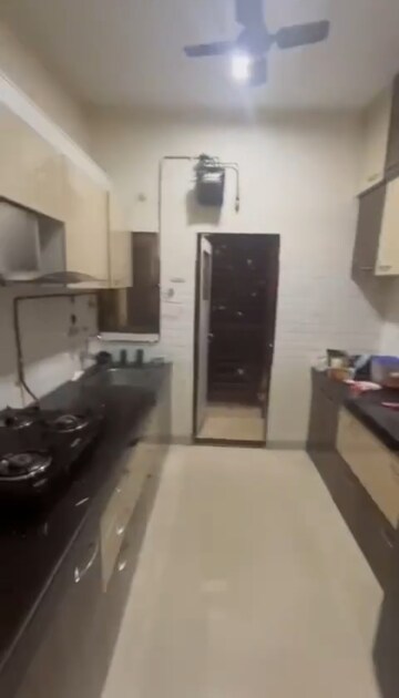 Kitchen in 2 BHK Apartment at Rajaram Sukur Enclave C Wing, Ghodbunder Road – for Sale