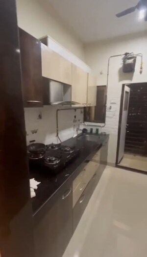 Kitchen in 2 BHK Apartment at Rajaram Sukur Enclave C Wing, Ghodbunder Road – for Sale