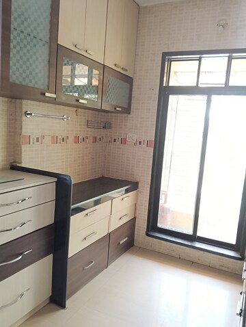 Kitchen in 2 BHK Apartment at Sarvoday Tower, Dombivli West – for Rent