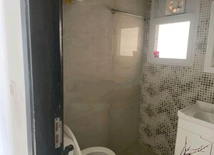Bathroom in 3 BHK Apartment at Elite Golf Green, Sector 79 – for Sale