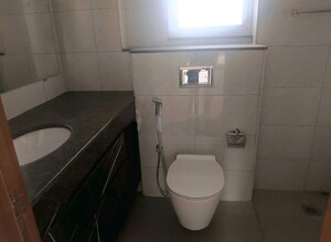 Bathroom in 2 BHK Apartment at Godrej Woods, Sector 43 – for Sale