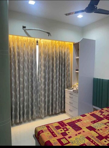 Bedroom in 2 BHK Builder Floor at SS Balaji Aangan, Thakurli – for Rent