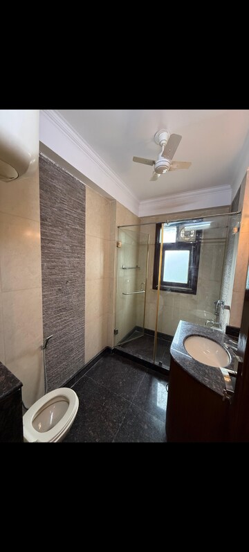 Bathroom in 4 BHK Builder Floor at Pamposh Enclave – for Rent