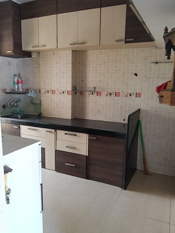 Kitchen in 2 BHK Apartment at Tulsi Vihar CHS, Dombivli West – for Sale