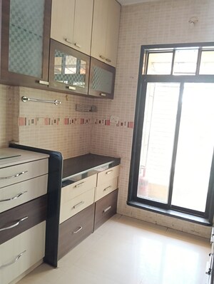 Kitchen in 2 BHK Apartment at Tulsi Vihar CHS, Dombivli West – for Sale