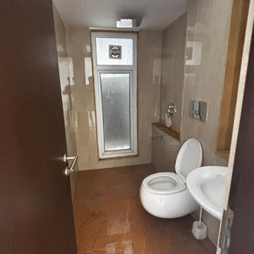 Bathroom in 2 BHK Apartment at Ruparel Ariana, Police Line – for Rent