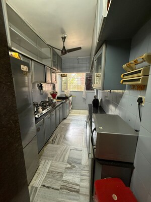 Kitchen in 2 BHK Apartment at Mangal Kunj, Khar West – for Sale
