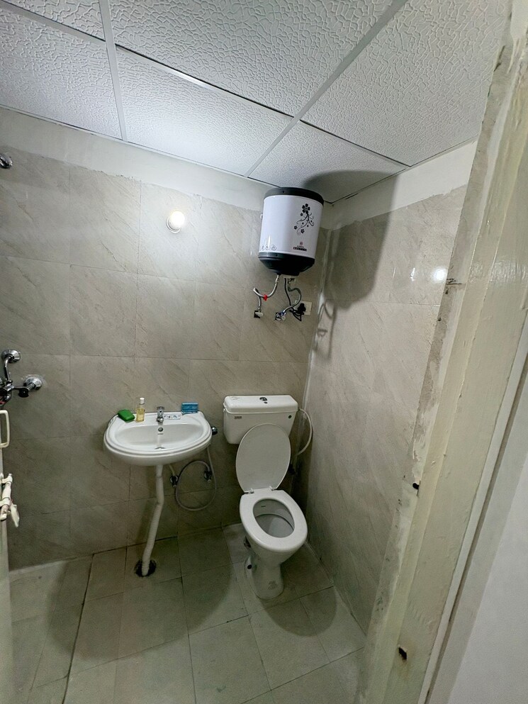 Bathroom, signature-global-the-millennia 2 Bedroom 601 Sq.Ft. Apartment In Sector 37d Gurgaon 8779241