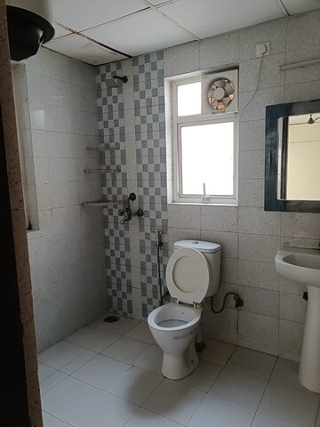 Bathroom in 2.5 BHK Apartment at Logix Blossom Greens, Sector 143 – for Rent