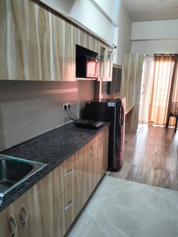 Kitchen in 1 BHK Apartment at Paramount Golfforeste, Zeta I Greater Noida – for Rent