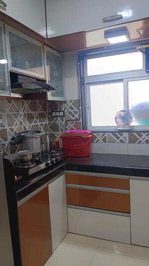 Kitchen in 1 BHK Apartment at Shraddha Evoque, Bhandup West – for Sale
