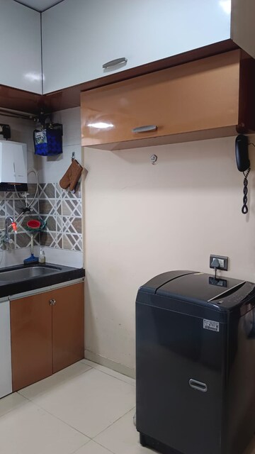 Kitchen in 1 BHK Apartment at Shraddha Evoque, Bhandup West – for Sale