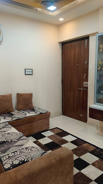 Living Room in 1 BHK Apartment at Shraddha Evoque, Bhandup West – for Sale