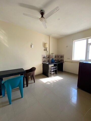 Living Room in 1 BHK Apartment at Urbtech Xaviers, Sector 168 – for Rent