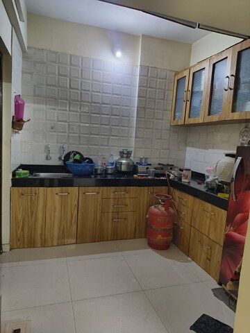 Kitchen in 2 BHK Apartment at Sonigara Shloka, Chikhali – for Sale