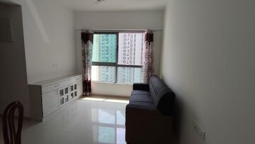 Living Room in 2 BHK Apartment at Kalpataru Immensa, Kolshet Road – for Rent