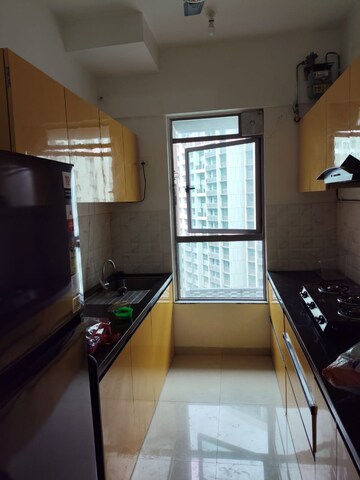 Kitchen in 2 BHK Apartment at Kalpataru Immensa, Kolshet Road – for Rent