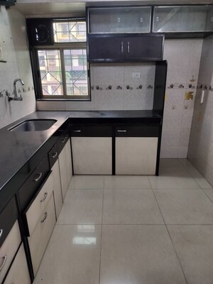 Kitchen in 1 BHK Apartment at Lenyadri Tower, Nerul – for Sale