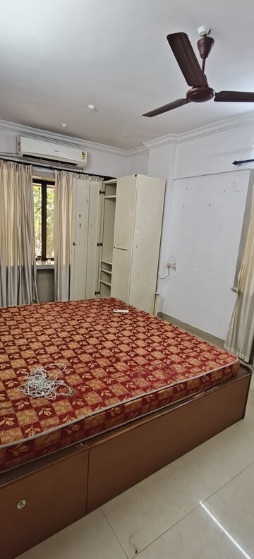 Bedroom in 2 BHK Apartment at Surya Kiran CHS Andheri, Andheri West – for Rent
