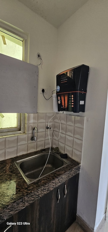 Kitchen in 2.5 BHK Apartment at Migsun Ultimo, Omicron Iii Greater Noida – for Rent