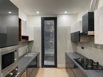 Kitchen in 3 BHK Apartment at M3M Golf Hills, Sector 79 – for Sale