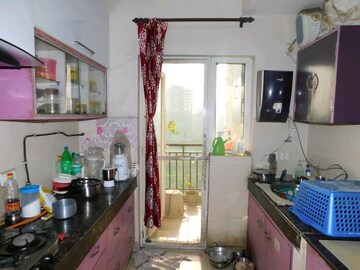 Kitchen in 2.5 BHK Apartment at Paramount Symphony, Sain Vihar – for Sale