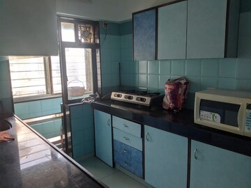 Kitchen in 2 BHK Apartment at Rustomjee Central Park, Andheri East – for Rent