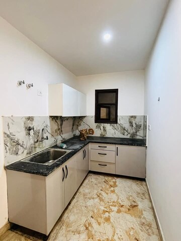 Kitchen in 2 BHK Builder Floor at Freedom Fighters Enclave – for Rent