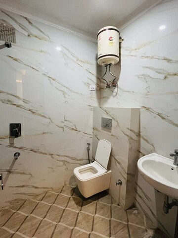 Bathroom in 2 BHK Builder Floor at Freedom Fighters Enclave – for Rent