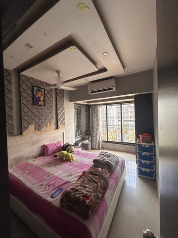 Bedroom in 2 BHK Apartment at Zaveri Ashtavinayak CHS, Andheri West – for Rent