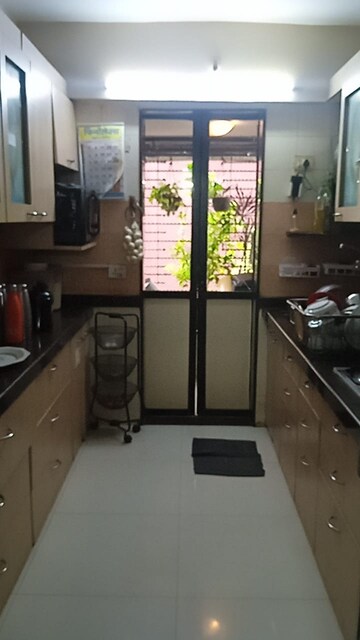 Kitchen in 2 BHK Apartment at Satellite Garden, Goregaon East – for Sale