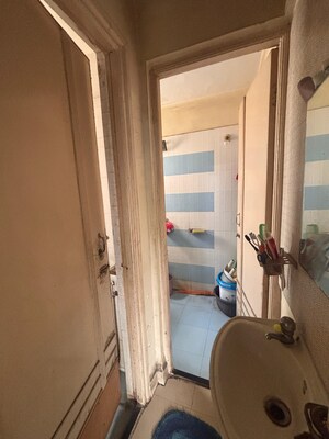 Bathroom in 1 BHK Apartment at New Brahmand Phase 7 CHS, Brahmand – for Sale