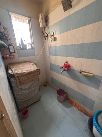 Bathroom in 1 BHK Apartment at New Brahmand Phase 7 CHS, Brahmand – for Sale