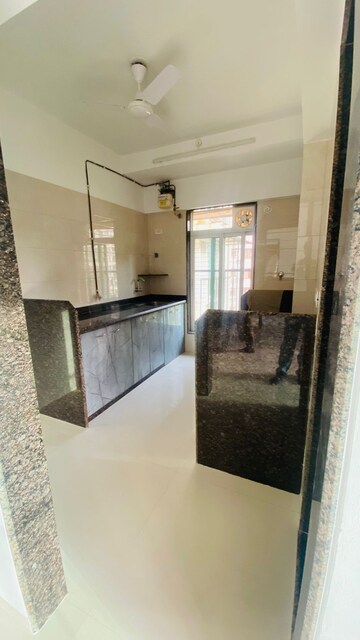 Kitchen in 1 BHK Apartment at Gada Swami Darshan, Kandivali West – for Sale