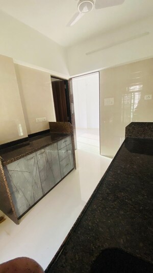 Kitchen in 1 BHK Apartment at Gada Swami Darshan, Kandivali West – for Sale