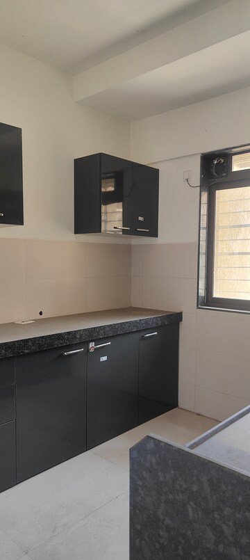 Kitchen in 4 BHK Apartment at Acme Ozone, Manpada – for Rent