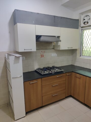 Kitchen in 3 BHK Builder Floor at Ansal API Esencia, Sector 67 – for Rent