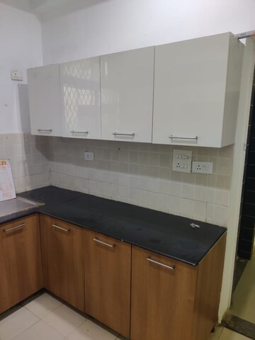 Kitchen in 3 BHK Builder Floor at Ansal API Esencia, Sector 67 – for Rent