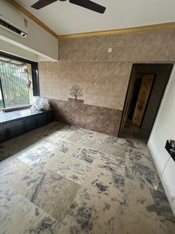 Living Room in 2 BHK Apartment at Royal Nest Malad West, Malad West – for Rent