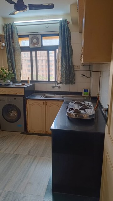 Kitchen in 3 BHK Apartment at Hiranandani Estate, Ghodbunder Road – for Rent